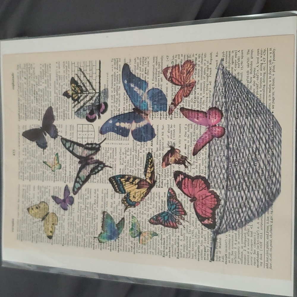 Butterfly art on old dictionary page